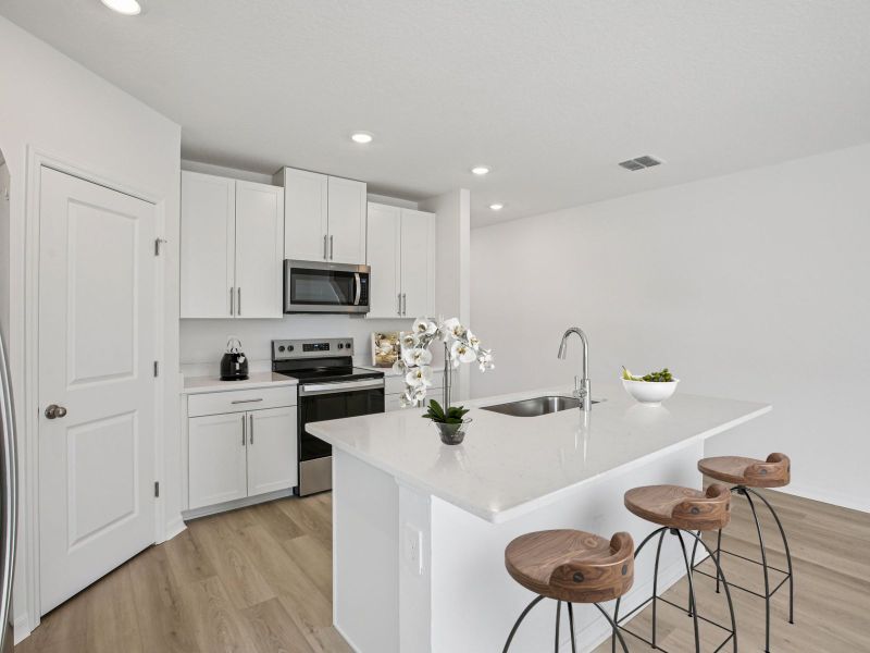 Furnished interior view inside a new home in Magnolia Bay - Classic Series, Nokomis (Image 3).