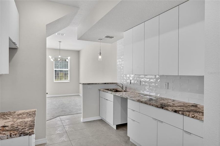 Furnished interior view inside a new home in , Davenport (Image 10).