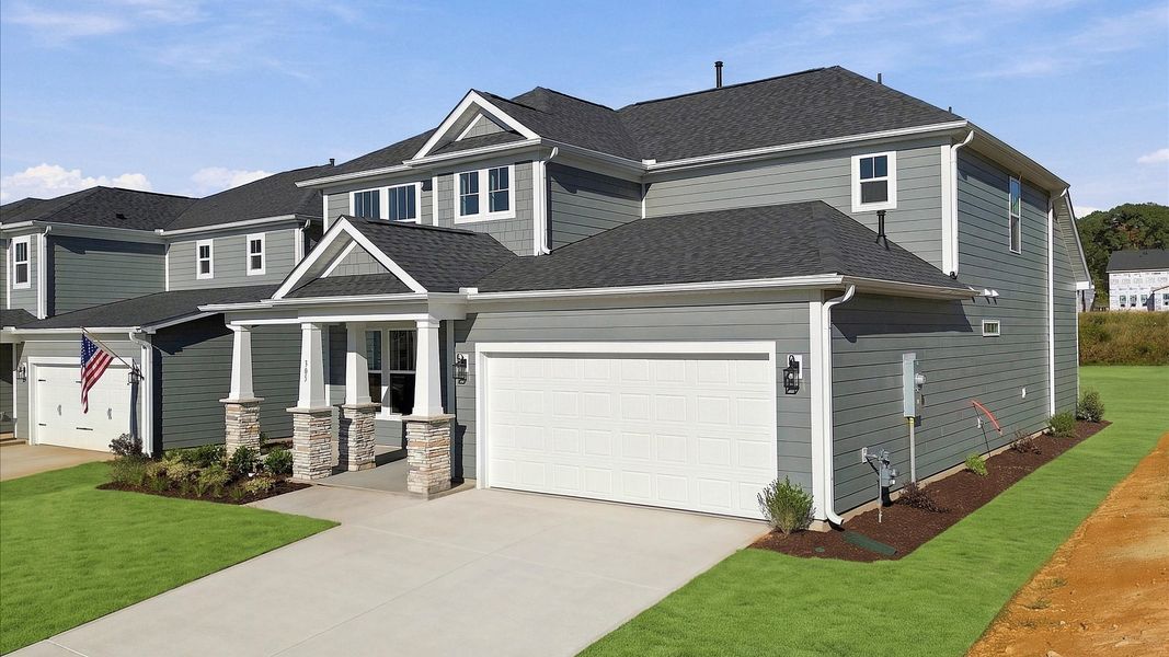 Exclusive DRB Homes exterior with balanced proportions and vibrant curb appeal