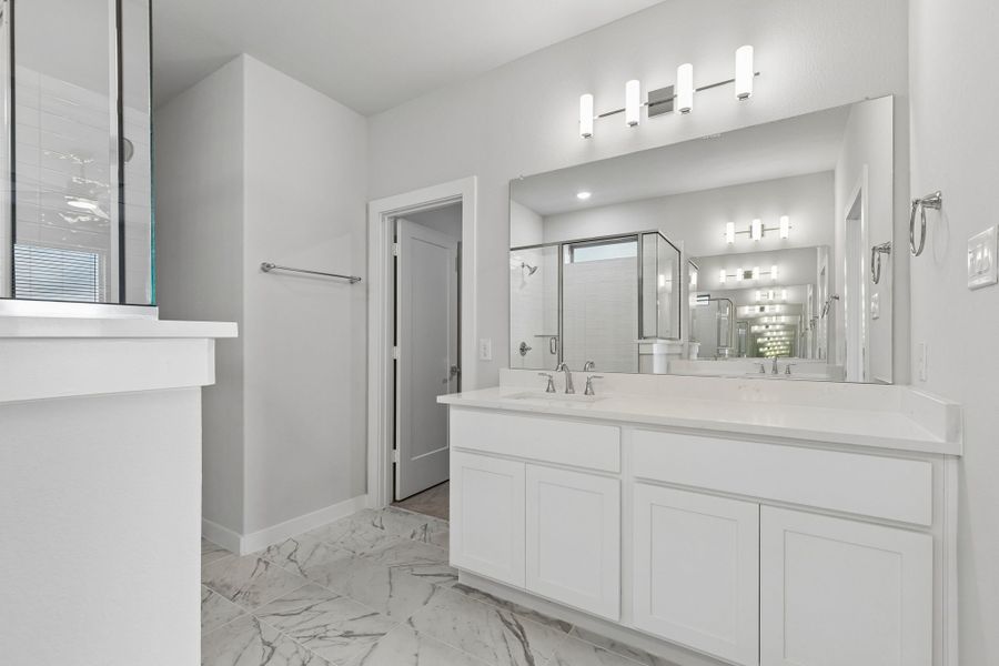 Primary Bathroom in the Winters home plan by Trophy Signature Homes – REPRESENTATIVE PHOTO