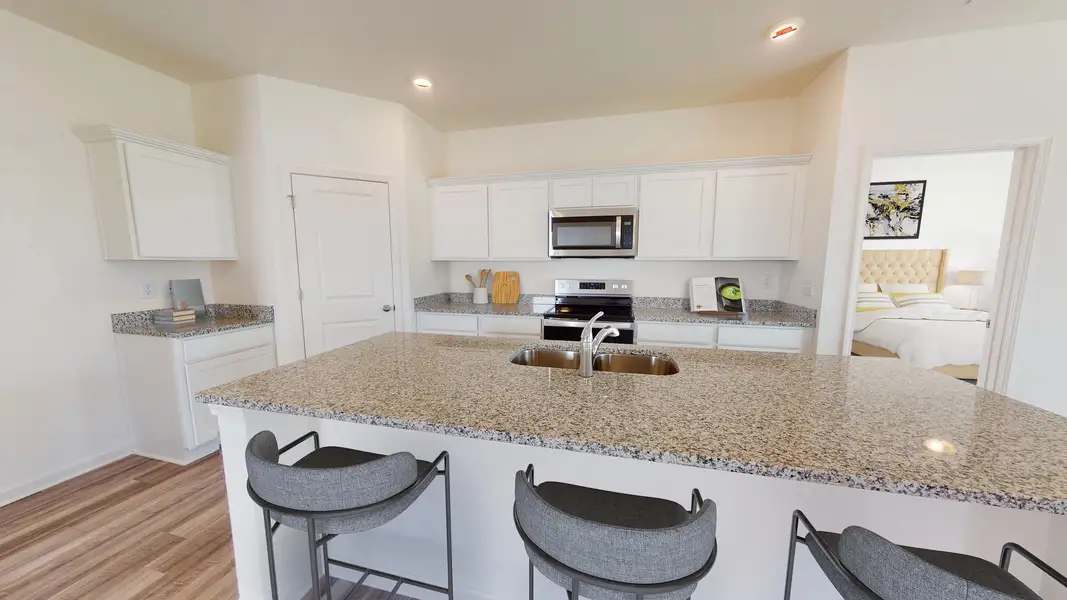 Representative furnished interior of a home built from the Equinox by Starlight Homes in Oakfield Lakes, Parrish (Image 3).