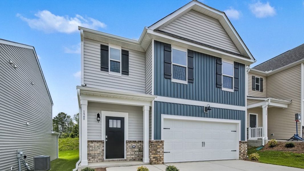 Representative exterior photo of a completed home built from the Robie by D.R. Horton in The Grove at Matthews Landing, Fuquay Varina, NC (Image 20).