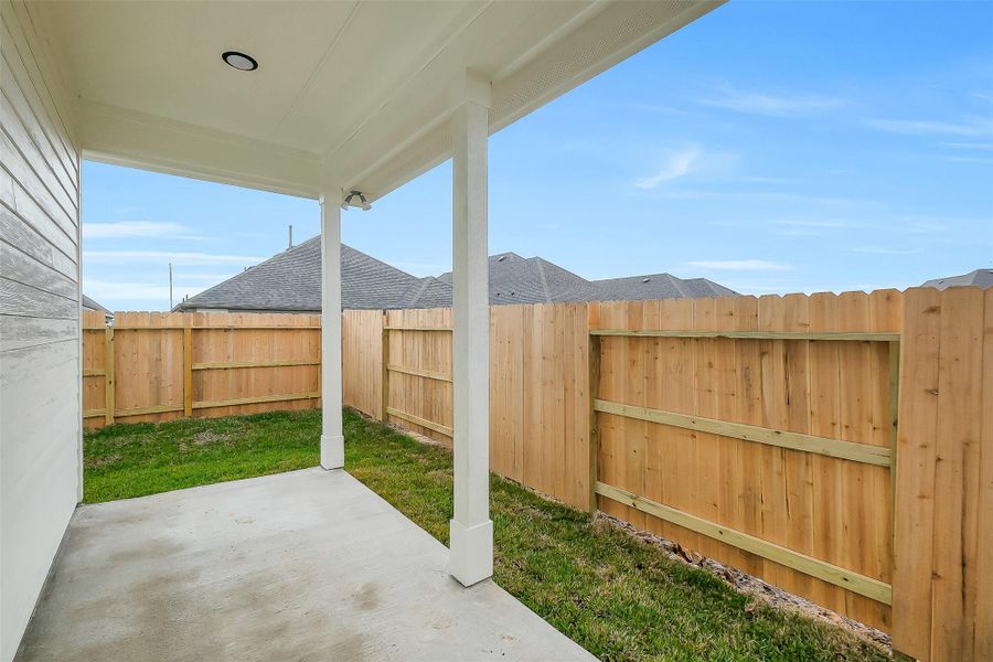 Exterior details and patio area of a home in Aldeana, Bonney (Image 23).