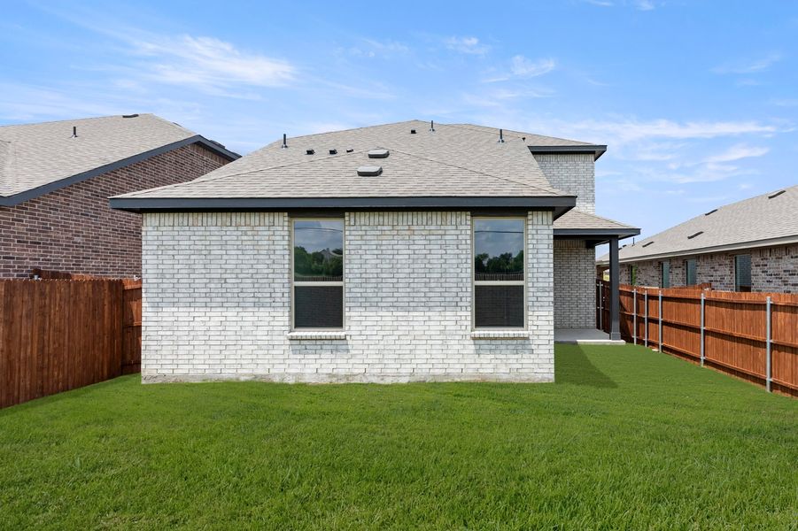 Front exterior of a new home in Churchill, Anna, TX, highlighting curb appeal (Image 23). Front exterior of a new home in Churchill, Anna, TX, highlighting curb appeal (Image 23).