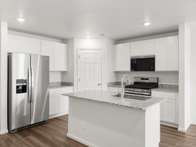 Furnished interior view inside a new home in Skyview at High Point, Aurora (Image 11).