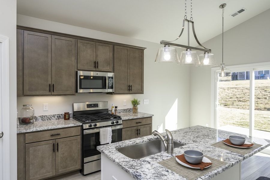 Representative furnished interior of a home built from the The Hunter by Cothran Homes in Holly Ridge, Greenville (Image 9).