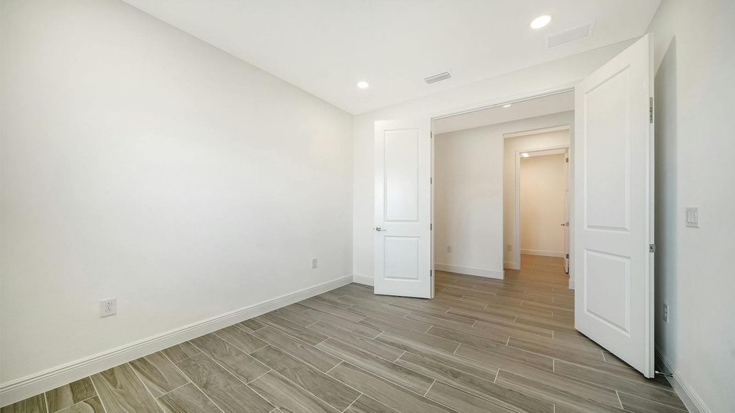 Spacious, unfurnished interior of a new home in Windward Real Estate and Homes for Sale in Sarasota, FL - Neal Communities, Lakewood Ranch (Image 44).