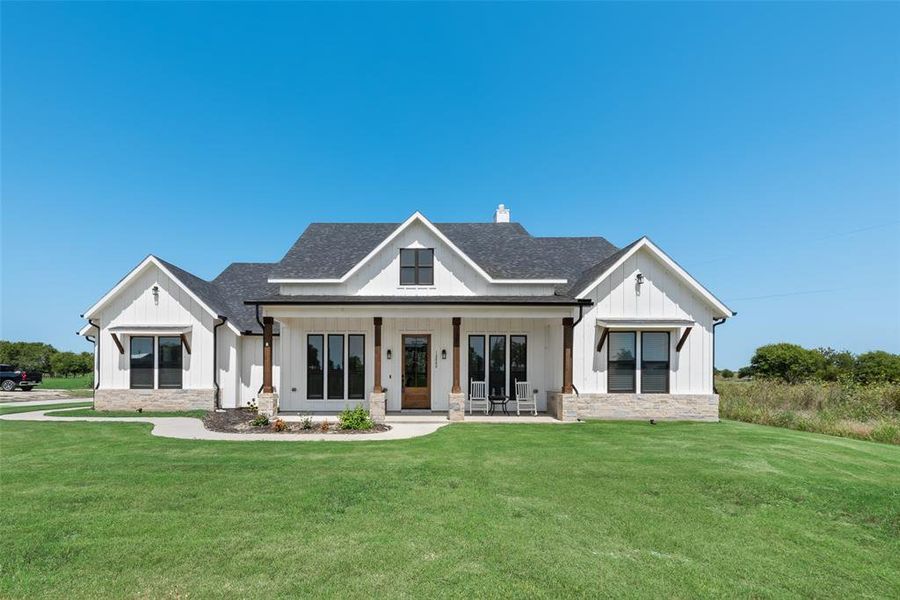 Front exterior of a new home in , Krum, TX, highlighting curb appeal (Image 19).