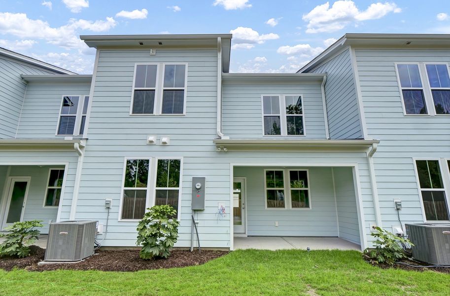 Front exterior of a new home in Grand Park, Leland, NC, highlighting curb appeal (Image 25).