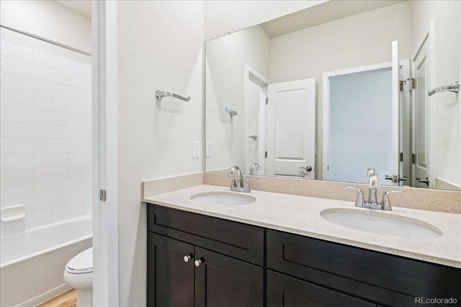 Furnished interior view inside a new home in Floret Collection at Alder Creek, Parker (Image 13).