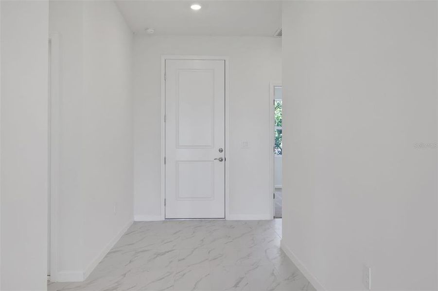 Spacious, unfurnished interior of a new home in Brystol North at Wylder, Port St. Lucie (Image 11).