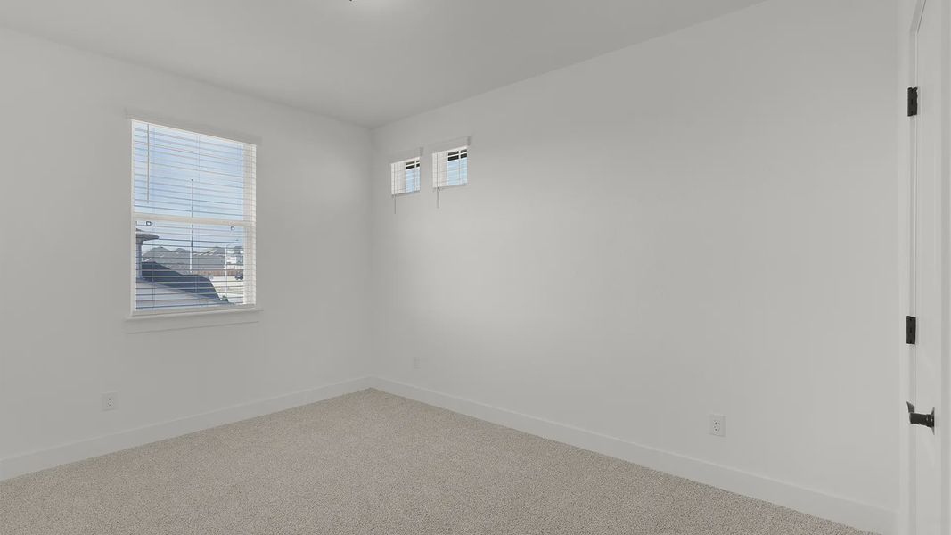 Representative unfurnished interior of a home built from the Cornell by Chesmar Homes in Crescent Bluff, Georgetown (Image 22).