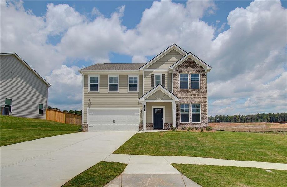 Front exterior of a new home in Chapel Hill, Newnan, GA, highlighting curb appeal (Image 13). Front exterior of a new home in Chapel Hill, Newnan, GA, highlighting curb appeal (Image 13).