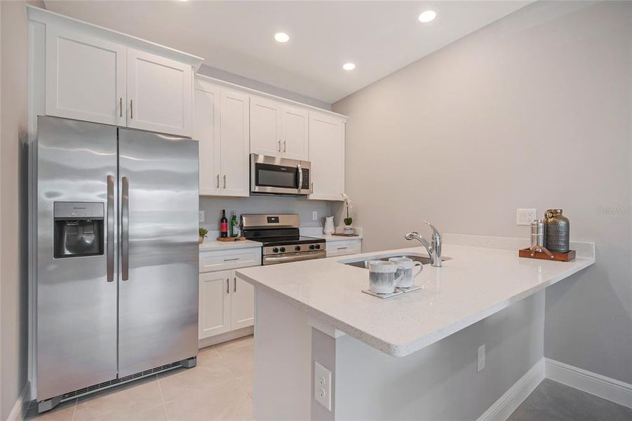 Furnished interior view inside a new home in , Kissimmee (Image 11). Furnished interior view inside a new home in , Kissimmee (Image 11).