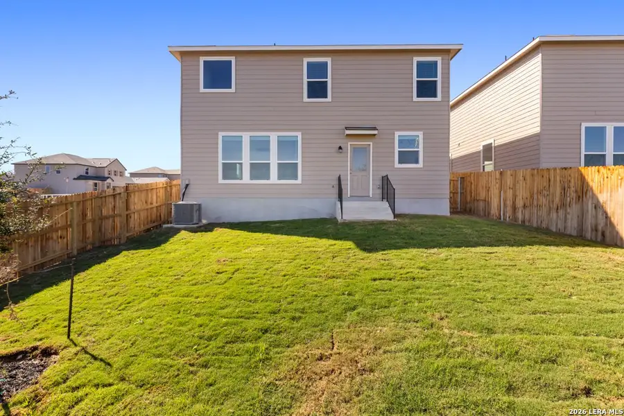 Exterior details and patio area of a home in Knox Ridge, Converse (Image 20).