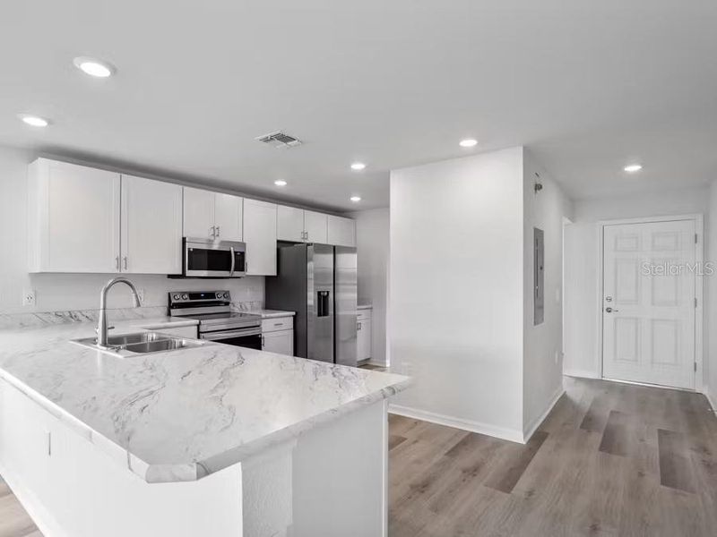 Furnished interior view inside a new home in , Winter Haven (Image 6).