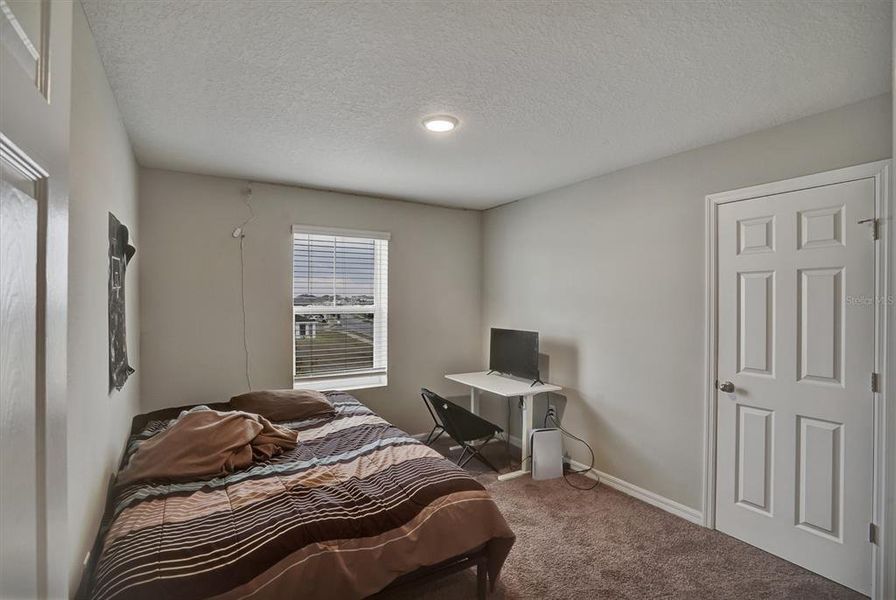 Furnished interior view inside a new home in Hammock Reserve, Haines City (Image 9).