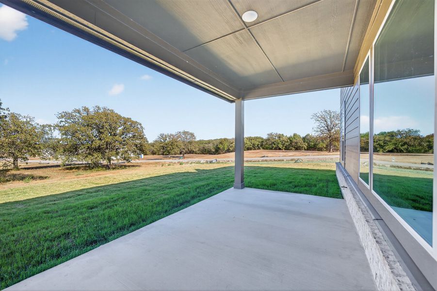 Exterior details and patio area of a home in Oak Grove Addition, Springtown (Image 28).