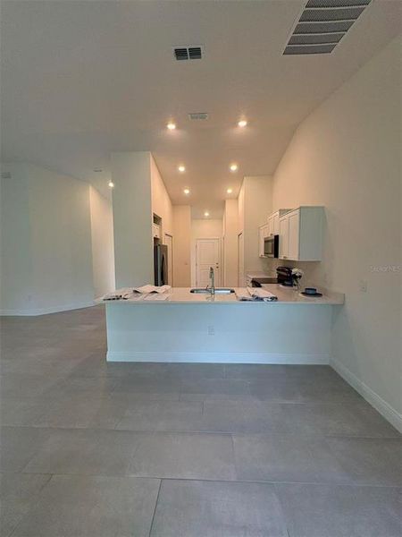 Furnished interior view inside a new home in , Deland (Image 9).