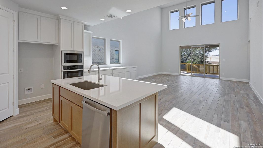 Furnished interior view inside a new home in Ladera 50', San Antonio (Image 14).