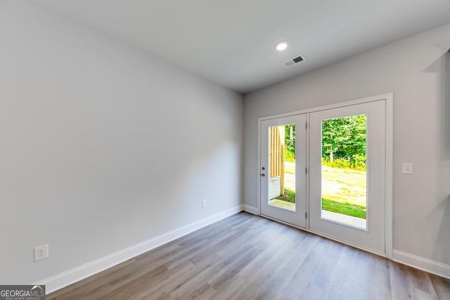 Spacious, unfurnished interior of a new home in Chimney Oaks Townhomes, Homer (Image 17). Spacious, unfurnished interior of a new home in Chimney Oaks Townhomes, Homer (Image 17).