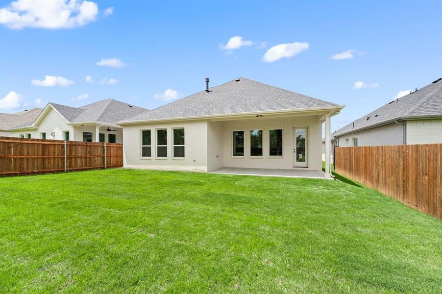 Front exterior of a new home in Parks of Aledo, Aledo, TX, highlighting curb appeal (Image 23). Front exterior of a new home in Parks of Aledo, Aledo, TX, highlighting curb appeal (Image 23).