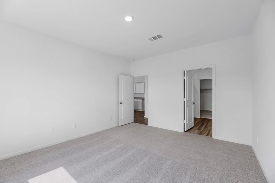 Representative unfurnished interior of a home built from the Kepler by Starlight Homes in Royal Pines, Porter (Image 16).