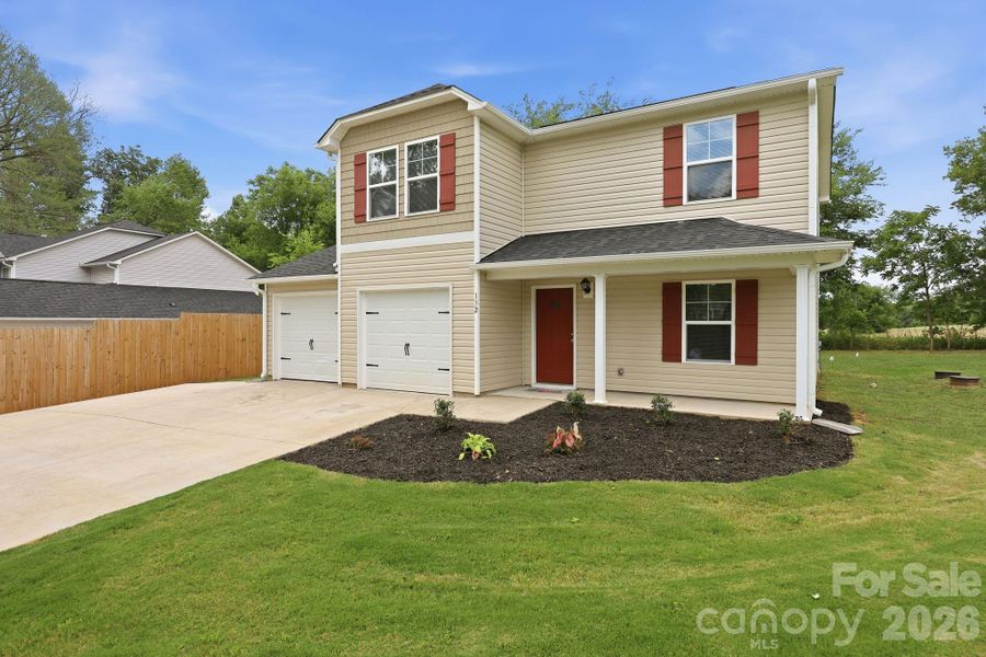 Front exterior of a new home in , Lexington, NC, highlighting curb appeal (Image 26).