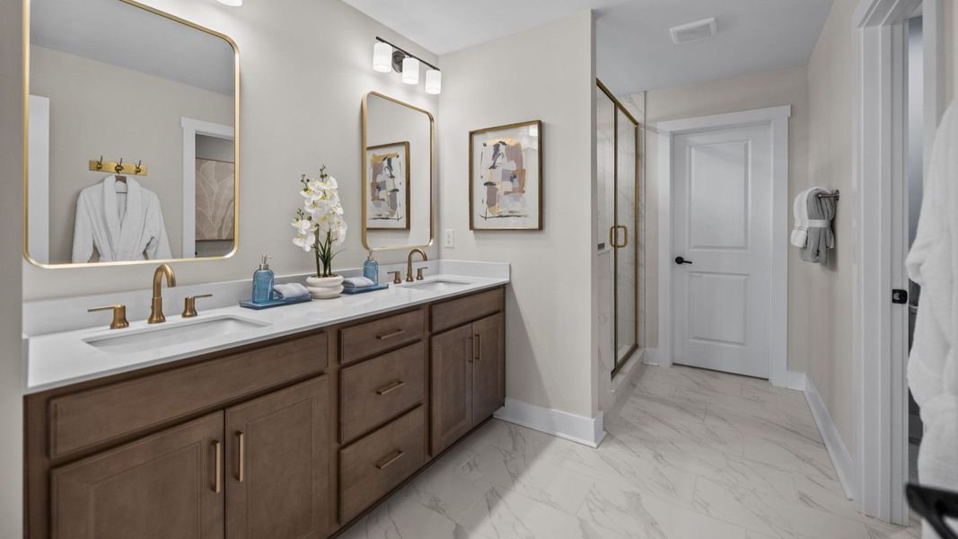 The Stonefield Home Plan in Michaux Garden by DRB Homes in Belmont, NC. - Primary Bathroom