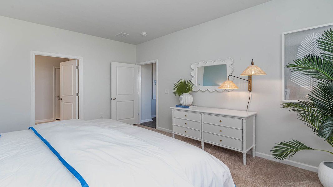 Representative furnished interior of a home built from the CALI by D.R. Horton in Harper Meadows, Loris (Image 26).