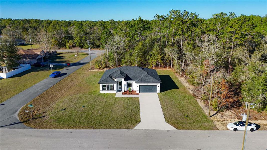 Front exterior of a new home in , Citrus Springs, FL, highlighting curb appeal (Image 23).