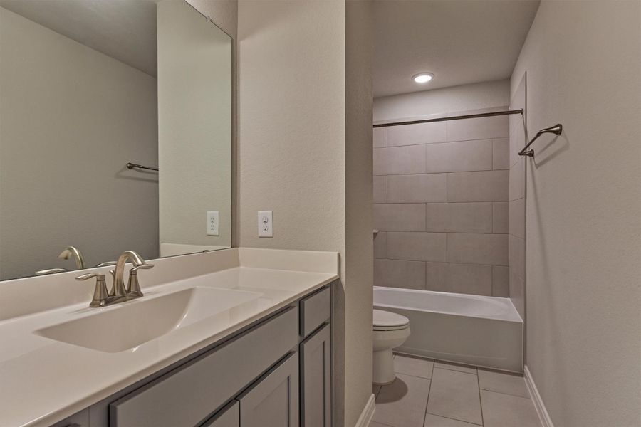 Furnished interior view inside a new home in The Highlands - Grove Collection, Porter (Image 5).