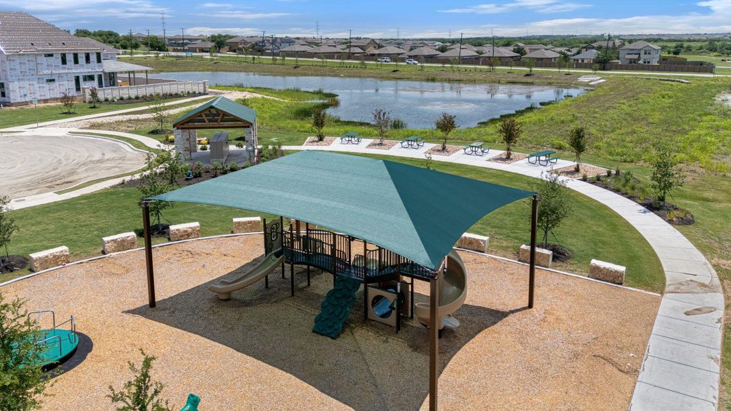 View of community featuring a residential view, a water view, and a patio area