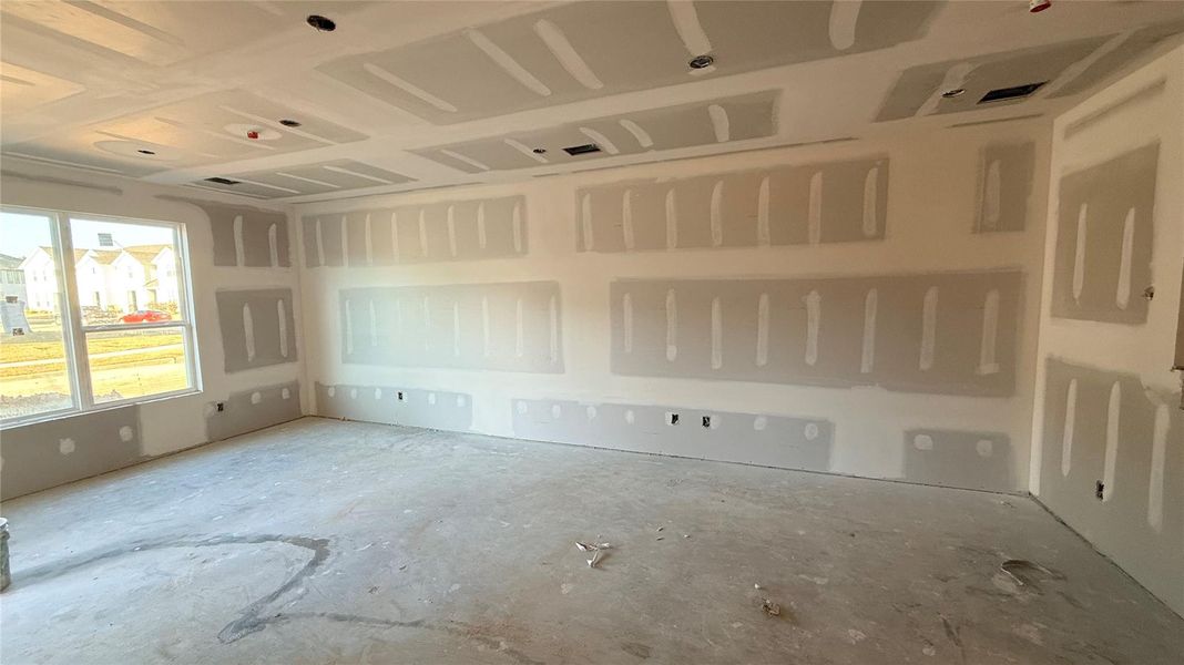 This family room serves as the heart of the home, perfect for entertaining, movie nights, or casual family time. Its open design flows seamlessly to the kitchen and dining areas, making it easy to connect with loved ones.