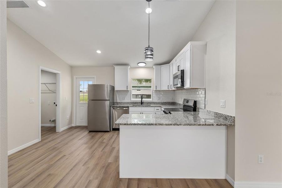 Furnished interior view inside a new home in , Dunnellon (Image 5).