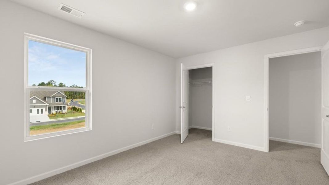 Spacious, unfurnished interior of a new home in Fairway 17 at Mirror Lake, Villa Rica (Image 21).