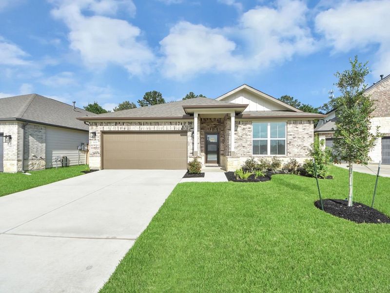 Front exterior of a new home in Sundance Cove, Crosby, TX, highlighting curb appeal (Image 22). Front exterior of a new home in Sundance Cove, Crosby, TX, highlighting curb appeal (Image 22).