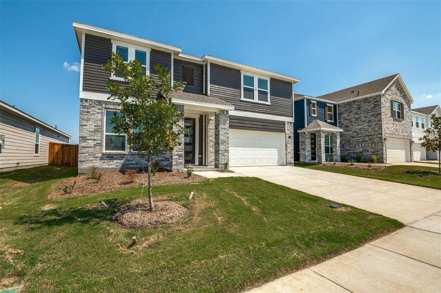 Front exterior of a new home in Cottonwood Creek, Seagoville, TX, highlighting curb appeal (Image 18).