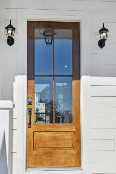 Exterior details and patio area of a home in Overlook at Copahee Sound, Awendaw (Image 45).