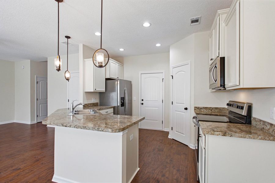 Representative furnished interior of a home built from the The Stacy by RTS Homes in Grand Reserve, Hinesville (Image 6).