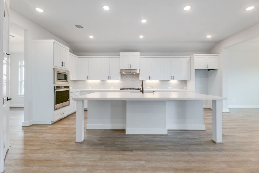 Furnished interior view inside a new home in Double Eagle Ranch, Cedar Creek (Image 6).