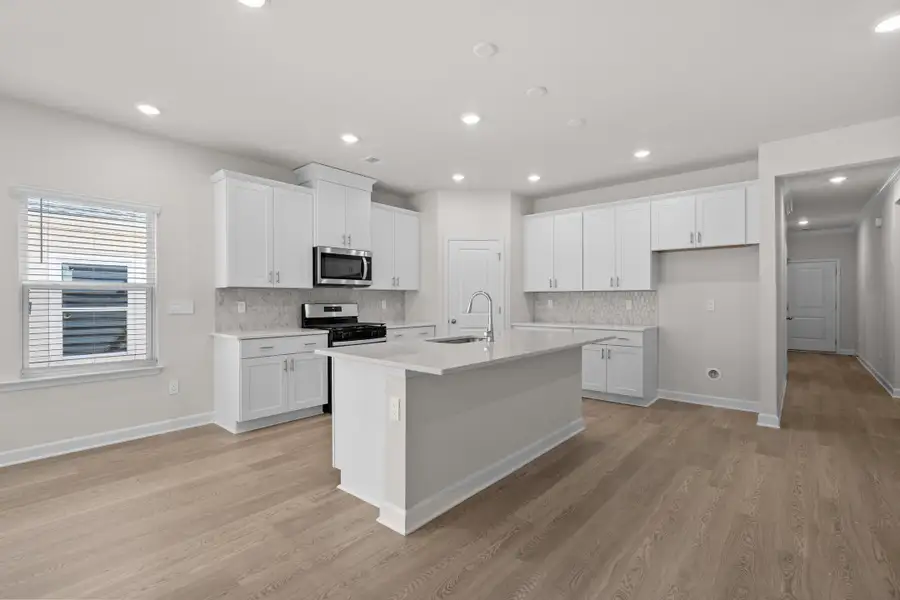 Furnished interior view inside a new home in Waterside - Coastline Series, Longs (Image 5).