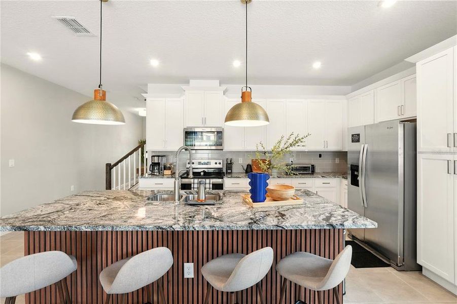 Furnished interior view inside a new home in , Kissimmee (Image 26).