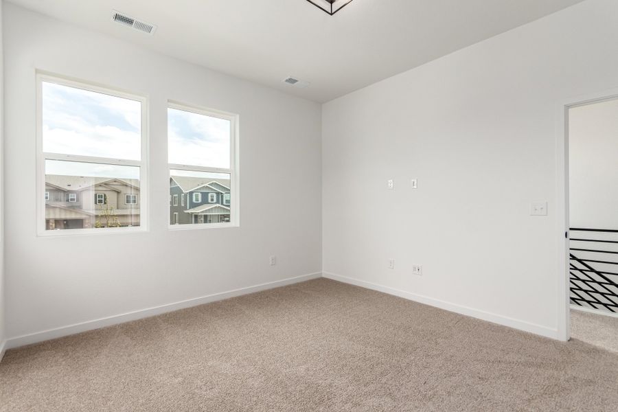 Spacious, unfurnished interior of a new home in Painted Prairie, Aurora (Image 18).