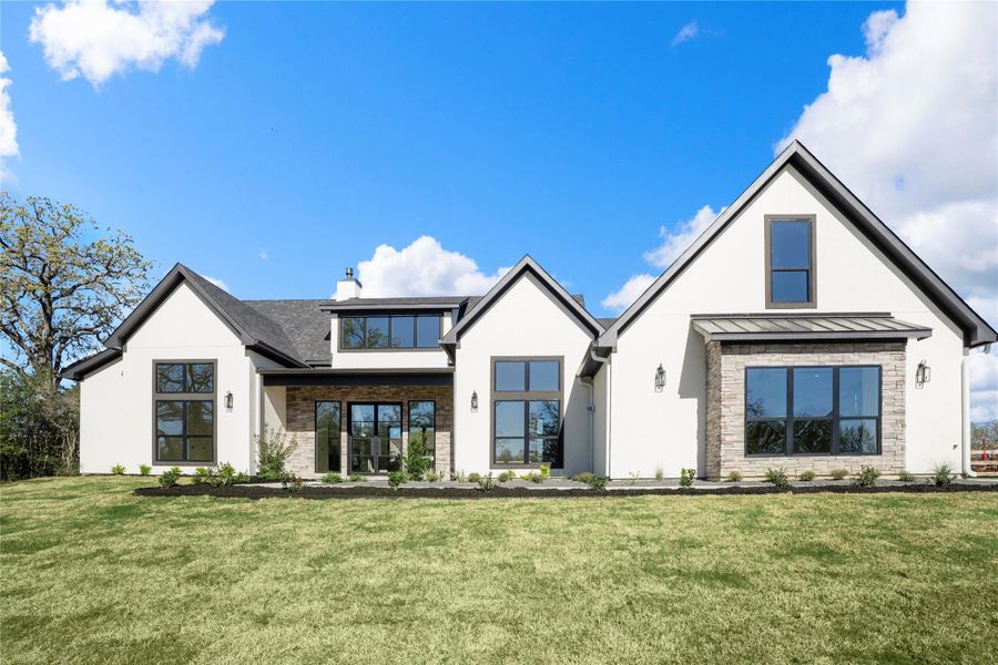 Front exterior of a new home in , Bryan, TX, highlighting curb appeal (Image 26). Front exterior of a new home in , Bryan, TX, highlighting curb appeal (Image 26).