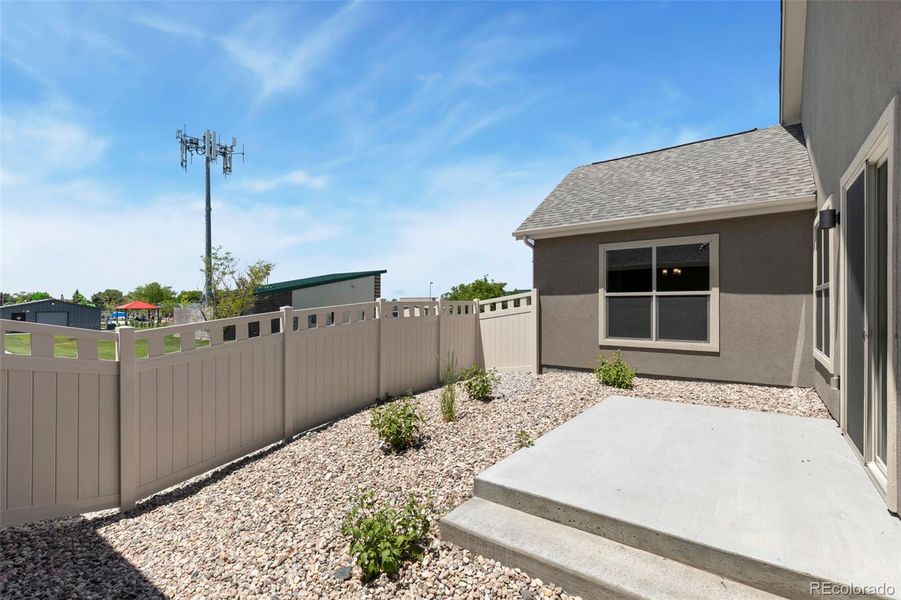 Front exterior of a new home in , Fort Lupton, CO, highlighting curb appeal (Image 2).