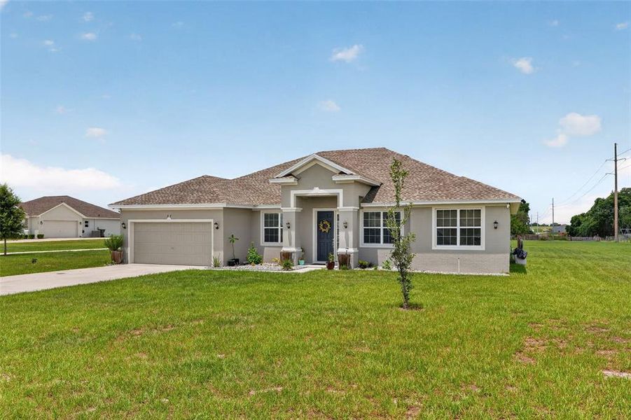Front exterior of a new home in , Bartow, FL, highlighting curb appeal (Image 2). Front exterior of a new home in , Bartow, FL, highlighting curb appeal (Image 2).