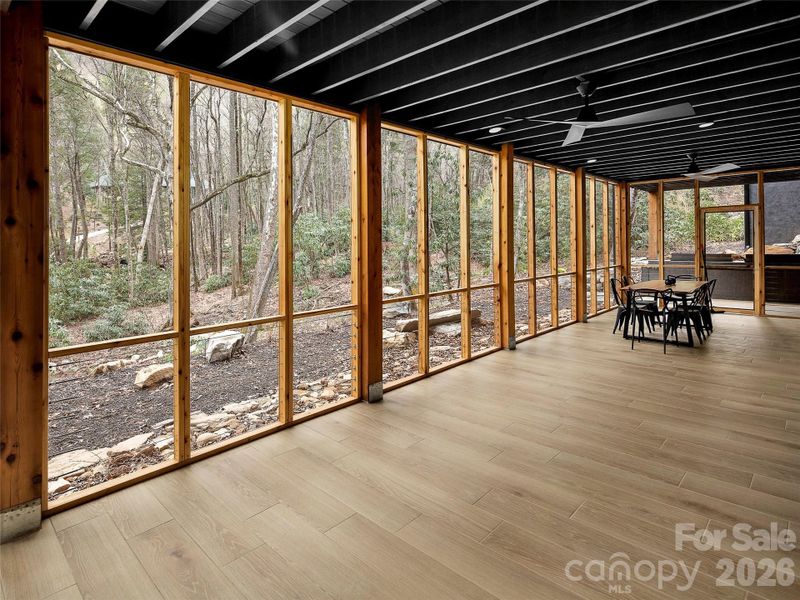 Downstairs porch with fans and heaters Downstairs porch with fans and heaters