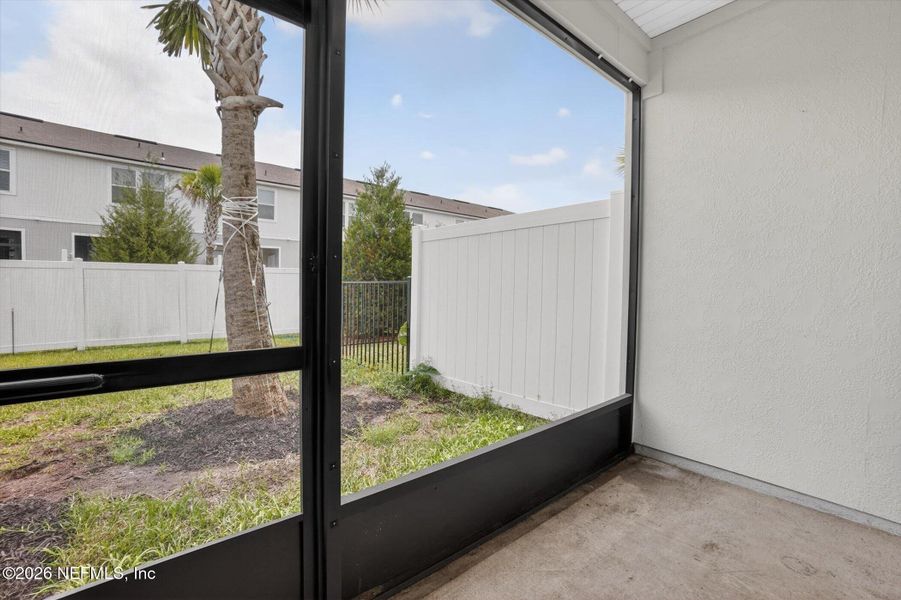 Exterior details and patio area of a home in Ravenswood Village, St. Augustine (Image 24).