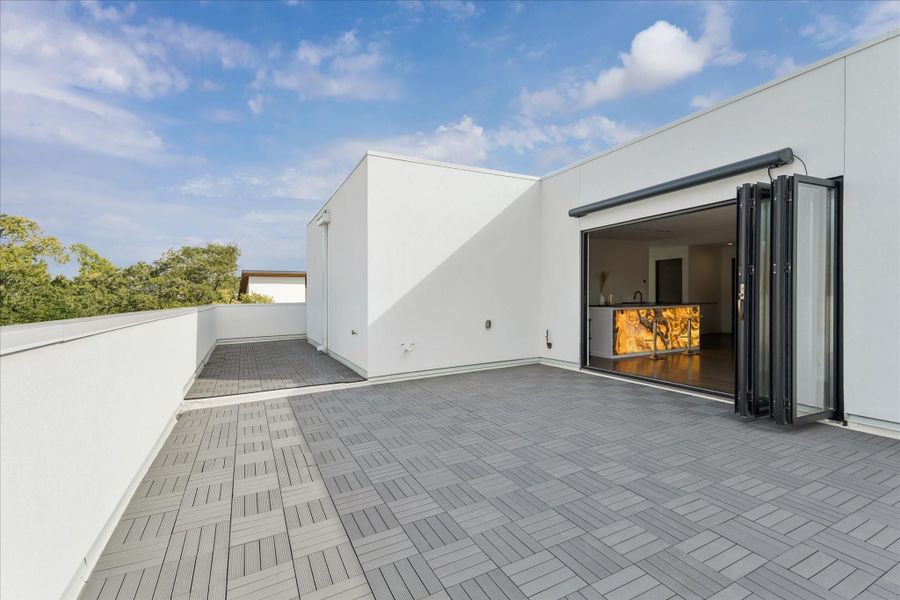 Expansive terrace leading to game room